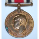 A Faithful Service in the Special Constabulary medal, Geo. VI, naming ARTHUR F. SIMPSON.