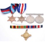A group of five medals to include 1939-1945 Star, France and Germany Star, Defence, War and St.