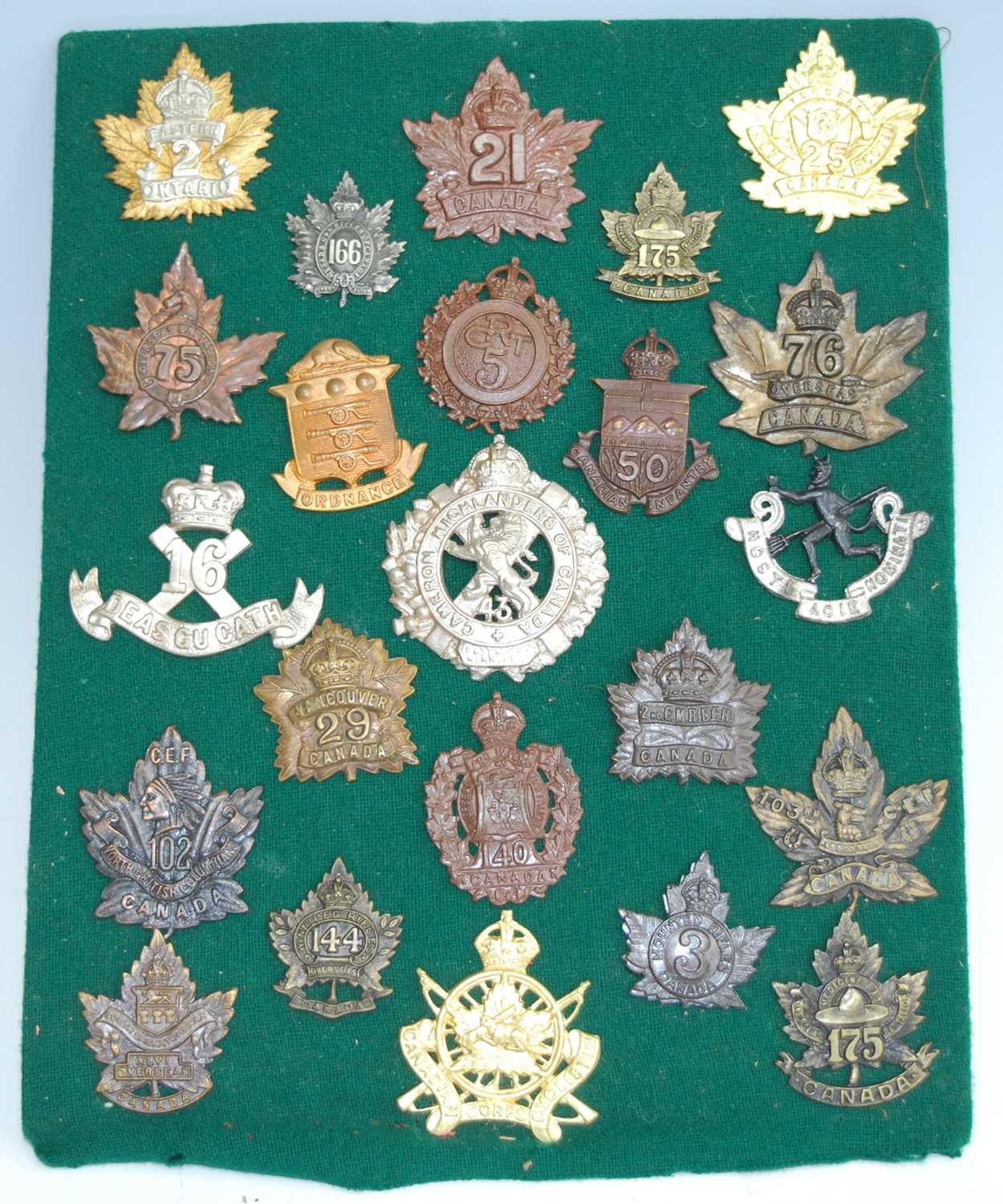 A collection of Canadian Regiment cap badges and insignia to include 48th Highlanders 15th
