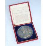 A Queen Victoria 1887 jubilee medal, obv; Victoria jubilee bust, rev; throned figure representing
