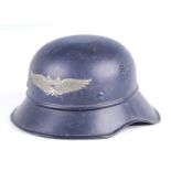 A German Luftschutz Gladiator pattern steel helmet, complete with leather liner and chin strap,