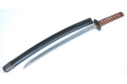 A Japanese Shinto Wakizashi, the 42cm slightly curved blade signed to the tang Hizen Tadayoshi, - Image 1 of 14