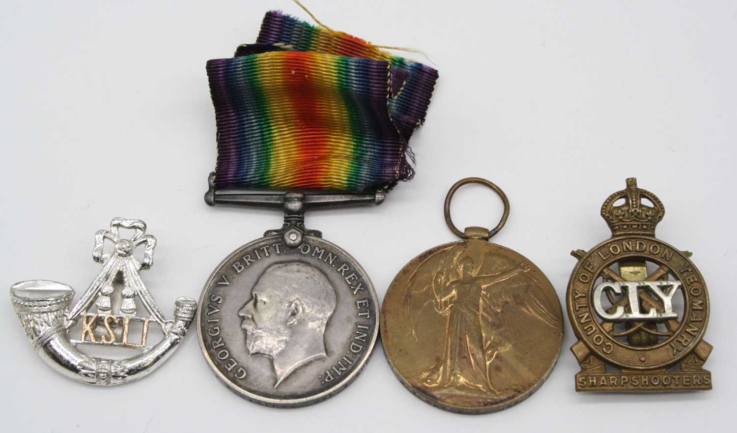 A WW I British War and Victory pair, naming 15712 CPL. A.E. MASTERS. OXF. & BUCKS L.I., together