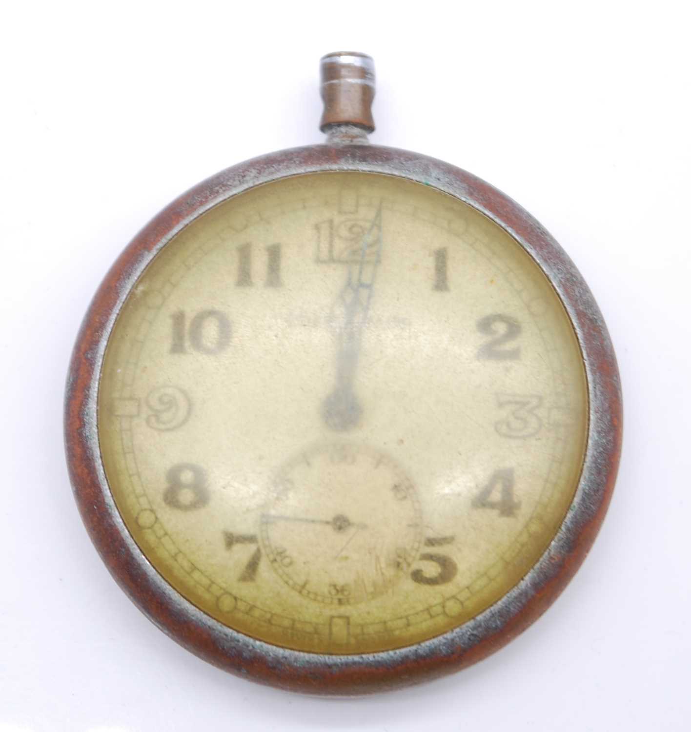 A Jaeger Le Coultre military issue open face pocket watch, having a signed white enamel dial with