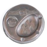 A German brass alloy ashtray, having a raised bust of Hitler with SS runes and Meine Ehre heist