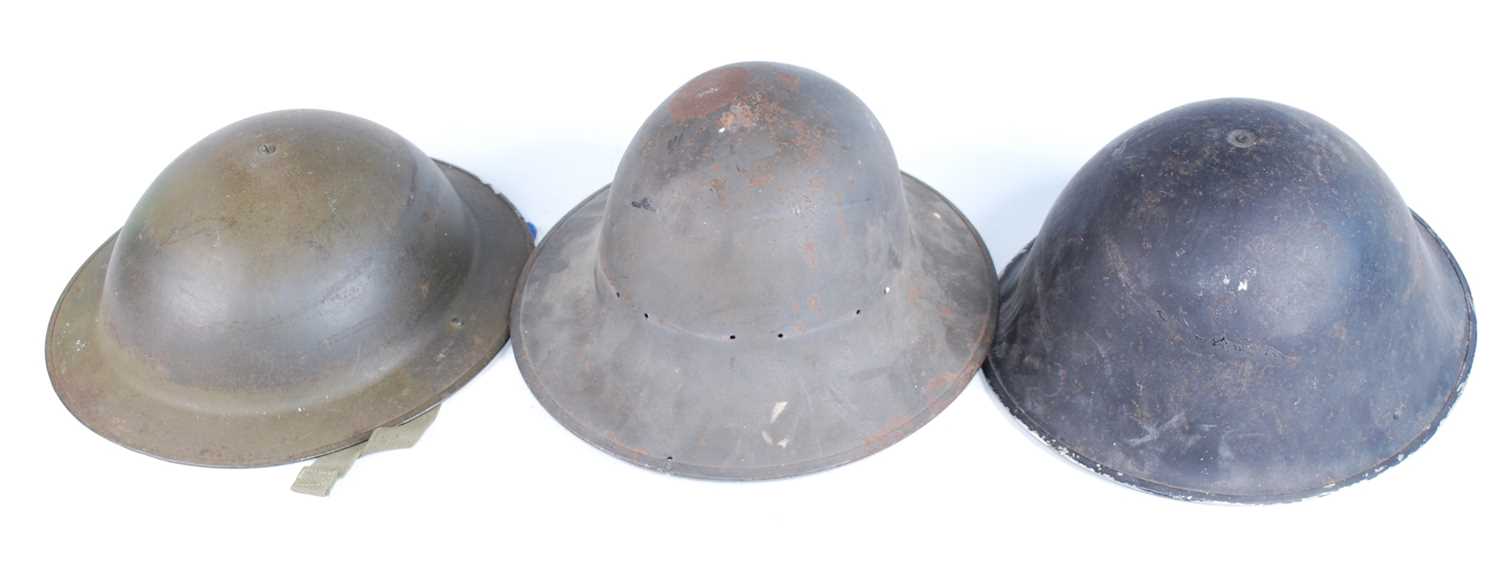 A post WW II Belgian Mk II Brodie clone helmet, the crown pad marked 58 ABL X.B 1952, having a