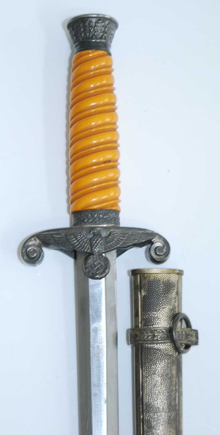 A German Third Reich Heer (Army) dagger, the 26cm double edged blade marked to the ricasso