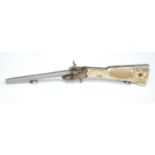 An early 20th century Continental miniature pin fire rifle, having a 5cm octagonal barrel and