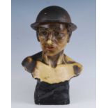 After Johannes Dommisse, (1878-1955), a painted plaster bust of a soldier, incised J. Dommisse 12