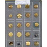 A large collection of fox hound and beagle brass hunt buttons arranged alphabetically from A-C