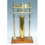 A large Naval dinner gong, the brass frame with central anchor flanked by a Union flag and Ensign,