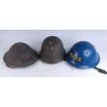 A WW II Homefront steel helmet, crudely painted to the front FAP (First Aid Party), having a leather