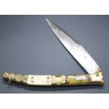 A 19th century Spanish Navaja knife, the 15.5cm blade stamped Beauvoir, with decorative bone and