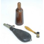 A 19th century leather shot flask, of typical pear shpe, the plated nozzle with measure for 1 and