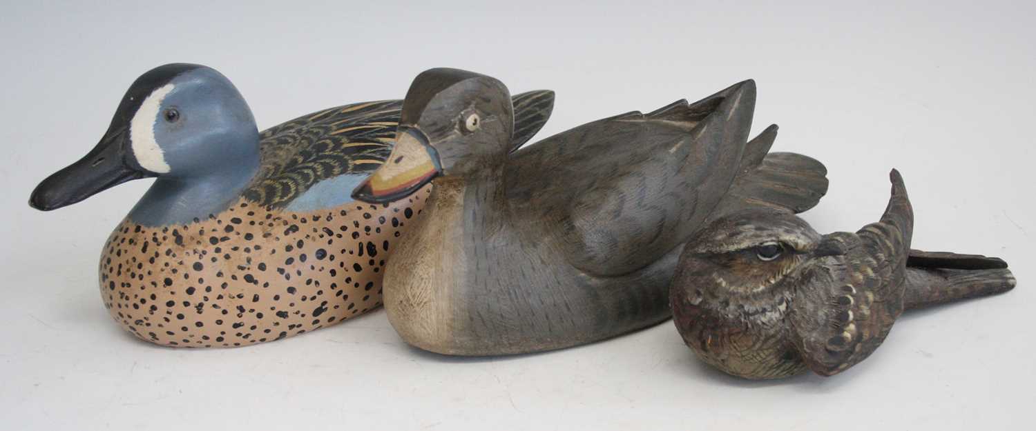 A carved pine and painted model of a tufted duck, signed verso John Keeble Brantham and dated