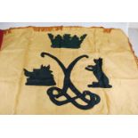 A silk flag for the Argyll and Sutherland Highlanders, having green sticthed crown and motifs on a