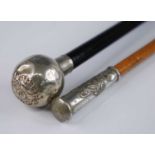 An early 20th century swagger stick, having an ebonised shaft and nickel cap with Rifle Brigade