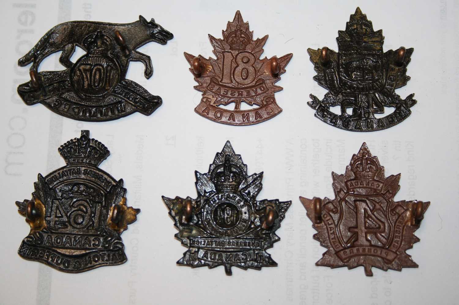 A collection of Canadian cap badges and insignia, to include 113th Battalion Lethbridge Highlanders, - Image 5 of 11