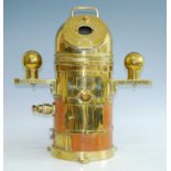 A "Faithful Freddie" brass cased submarine binnacle, the domed cover with two opposing hinged