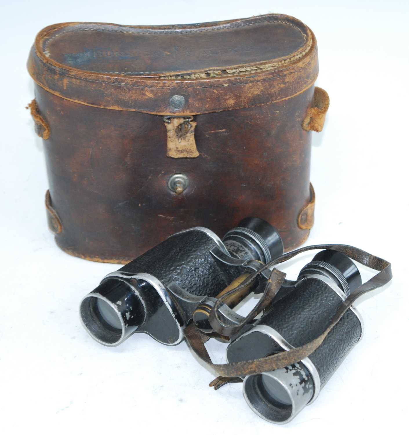 A pair of WW I French Bino Prism binoculars by E. Leger of Paris, S.I. 93859, in a leather case