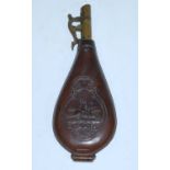 A 19th century horn powder flask, of ovoid form with screw cover, 12cm, together with an early