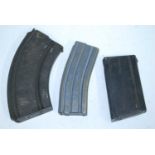 A Colt's Firearms Division 5.56 calibre magazine, together with a Bren magazine and one other. (3)
