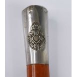 A WW II period swagger stick, having a malacca shaft and nickel cap with Royal Electrical Mechanical
