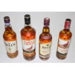 Bell's blended Scotch Whisky, two bottles and three half bottles; The Famous Grouse blended Scotch