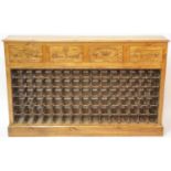 A hand-built pine wine rack, having three frieze drawers, each annotated with various Châteaux above