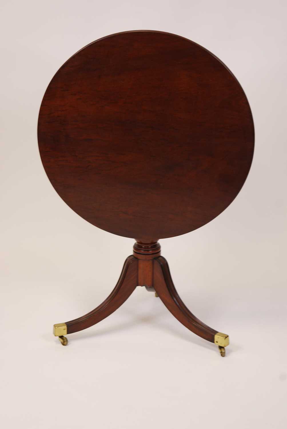 A Regency plum pudding mahogany circular tilt-top pedestal tripod table, raised on ring turned - Image 3 of 4