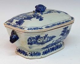 An 18th century Chinese blue and white porcelain tureen, the lid having a pomegranate handle,