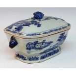 An 18th century Chinese blue and white porcelain tureen, the lid having a pomegranate handle,