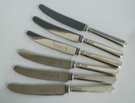 A set of eighteen Queen Elizabeth II silver handled table knives, having stainless steel blades,