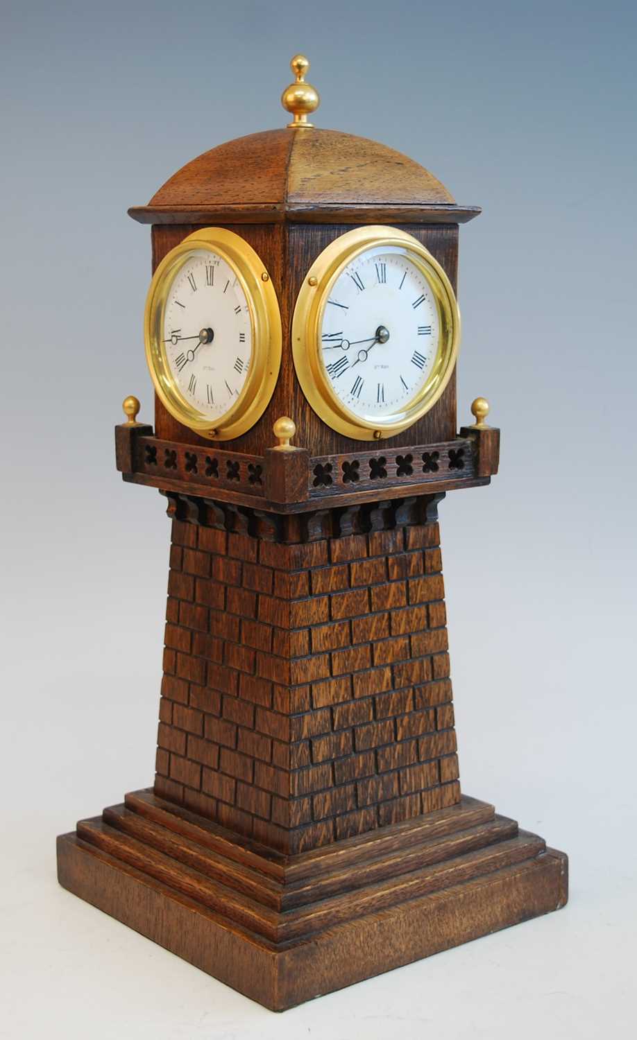 Henry Marc of Paris - a late 19th century oak four dial lighthouse clock, the four white enamel