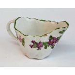 A circa 1780 Lowestoft porcelain 'Chelsea ewer' sauce boat, enamel decorated by 'The Tulip Painter',