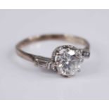 An 18ct gold diamond solitaire ring, the principle round brilliant cut diamond weighing approx 1.