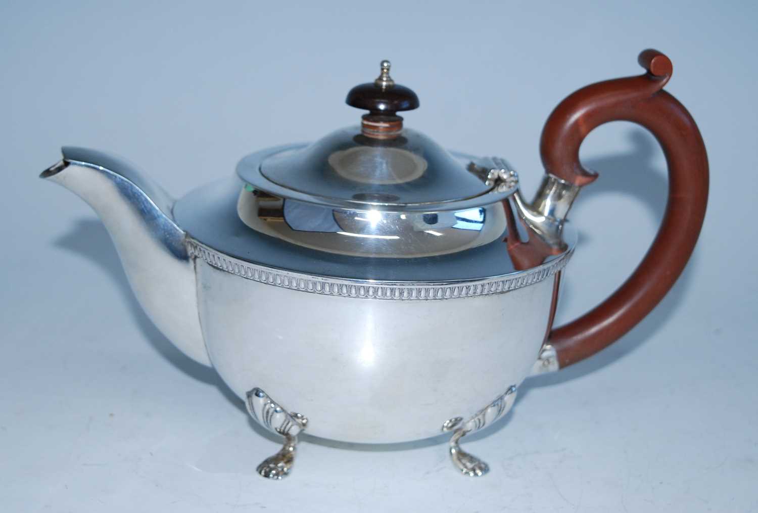 A mid-20th century silver four-piece tea set, comprising teapot, hot water pot, sugar and cream, - Image 3 of 10