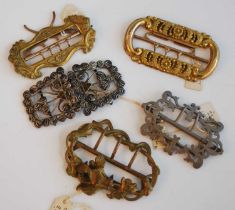 A collection of 19th century and later buckles, comprising a steel two-piece belt buckle, of