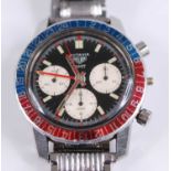 A gent's Heuer Autavia GMT stainless steel chronograph wristwatch, having red and blue Pepsi