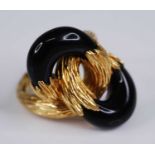 A Kutchinsky 18ct gold and black onyx set dress ring, of interlocking design, the gold with