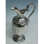 A Garrard & Co silver commemorative wine ewer for the Silver Wedding anniversary of Queen