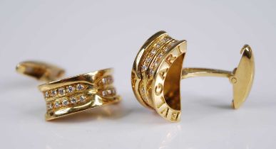 A pair of Bulgari B.01 18ct gold and diamond cufflinks, the 9mm wide half barrel shape set with