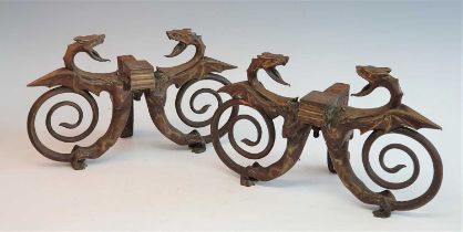 A pair of 19th century bronze andirons, each in the form of a pair of dragons, h.23.5cm