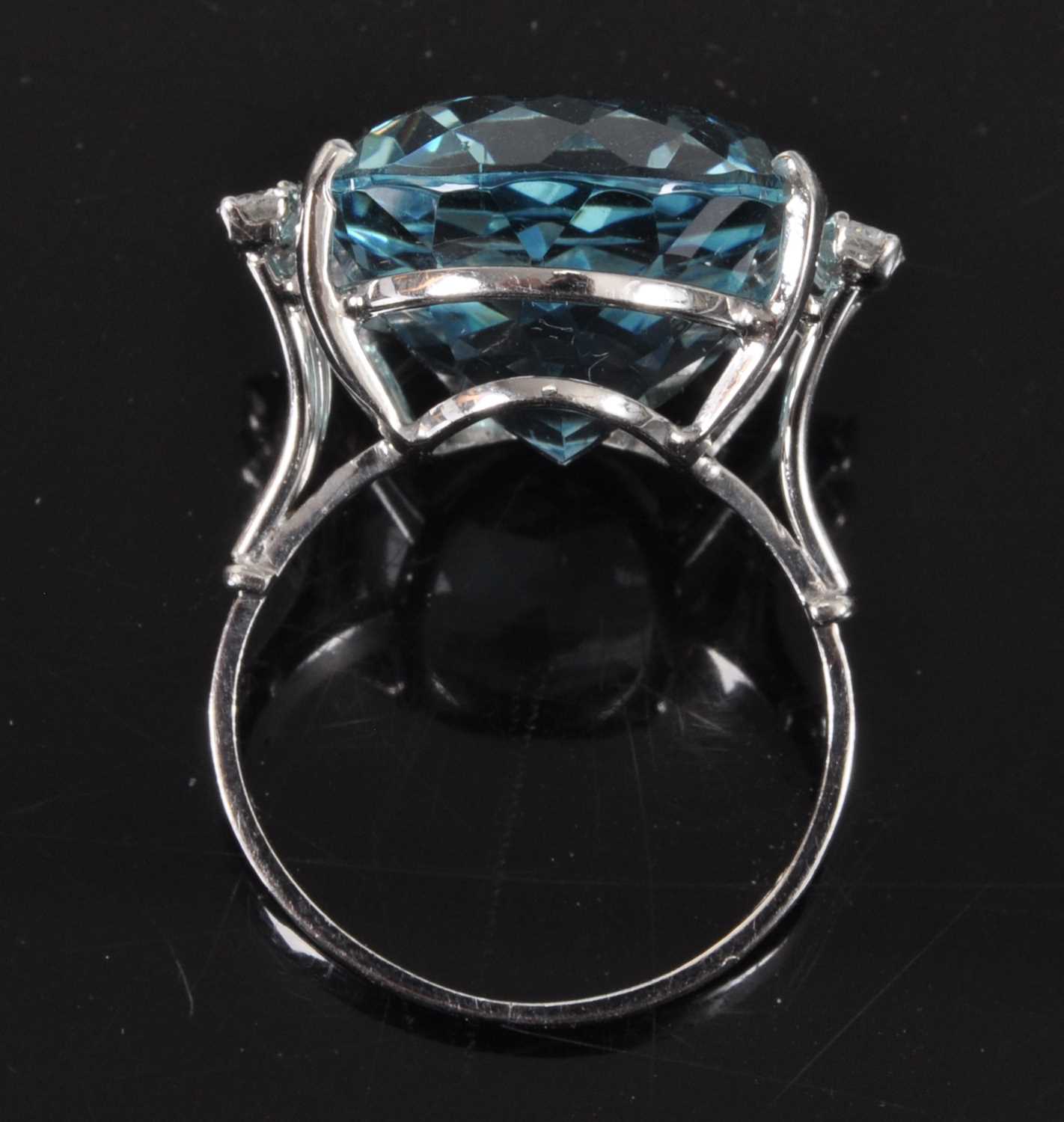 A white metal, aquamarine and diamond ring, comprising a centre oval aquamarine in a four claw - Image 5 of 7