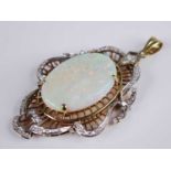 A yellow and white metal, opal and diamond openwork pendant, featuring a centre oval opal cabochon