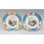 A pair of 19th century Sevres style porcelain plates, each decorated with scenes of a courting