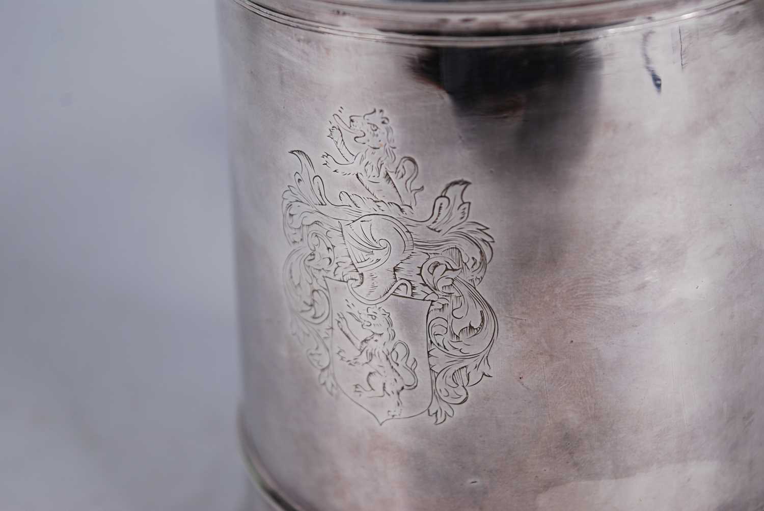 A George I silver lidded tankard, of flaring cylindrical form, the domed cover with scroll - Image 2 of 10