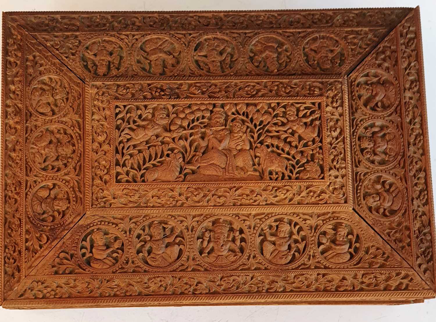 A 19th century Anglo-Indian sandalwood box, profusely carved with figures amongst foliage, the lid - Image 3 of 4
