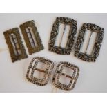 Three pairs of Georgian shoe buckles, one being oval convex with two frames of paste stones, 4.5 x