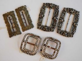 Three pairs of Georgian shoe buckles, one being oval convex with two frames of paste stones, 4.5 x